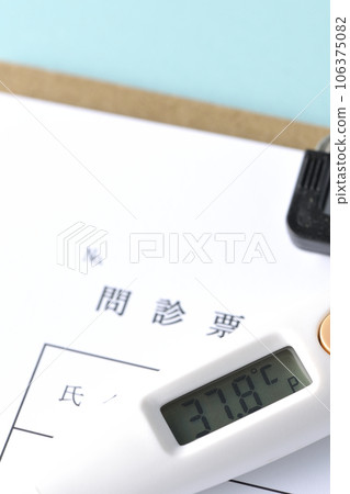 Questionnaire and thermometer Questionnaire and thermometer 106375082