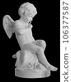 Angel statue isolated on white background. White stone sculpture of praying cherub isolated photo with clipping path 106377587