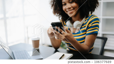 businesswoman hand using smart phone, tablet payments and holding credit card online shopping, omni channel, digital tablet docking keyboard computer at office businesswoman hand using smart phone, tablet payments and holding credit card online shopping, omni channel, digital tablet docking keyboard computer at office 106377689