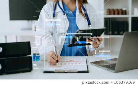 Project manager working and update tasks with Gantt chart scheduling diagram at hospital .success smart medical doctor working with smart medical doctor .. Project manager working and update tasks with Gantt chart scheduling diagram at hospital .success smart medical doctor working with smart medical doctor .. 106379169