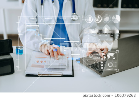 Project manager working and update tasks with Gantt chart scheduling diagram at hospital .success smart medical doctor working with smart medical doctor .. Project manager working and update tasks with Gantt chart scheduling diagram at hospital .success smart medical doctor working with smart medical doctor .. 106379268