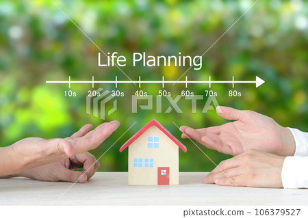 Hands of a couple discussing life planning about housing 106379527