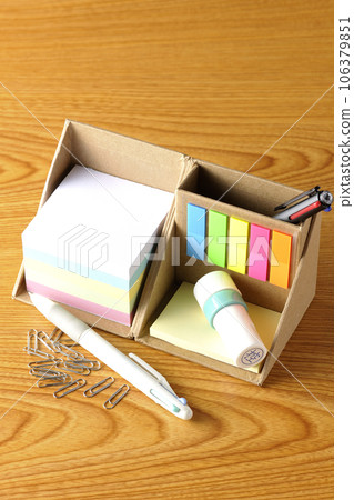 Sticky notes, clips, stamps and pens Sticky notes, clips, stamps and pens 106379851