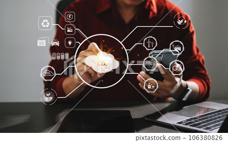 Businesswoman working virtual tablet computer twith reduce CO2 concept with icons, global warming such as reforest green factory recycle in office Businesswoman working virtual tablet computer twith reduce CO2 concept with icons, global warming such as reforest green factory recycle in office 106380826