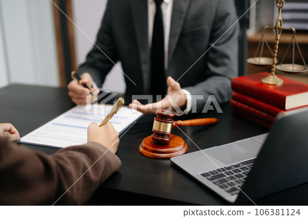Business and Male lawyer or judge consult having team meeting with client, Law and Legal services concept.Customer service good cooperation in office Business and Male lawyer or judge consult having team meeting with client, Law and Legal services concept.Customer service good cooperation in office 106381124