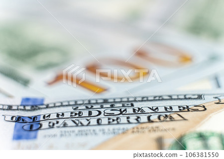 A lot of 100 dollar bills close-up macro, place for text. A lot of 100 dollar bills close-up macro, place for text. 106381550