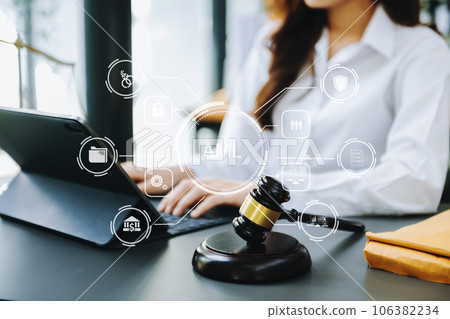 AML Anti Money Laundering Financial Bank Business Concept. judge in a courtroom using laptop and tablet with AML anti money laundering icon on virtual  screen. . 106382234