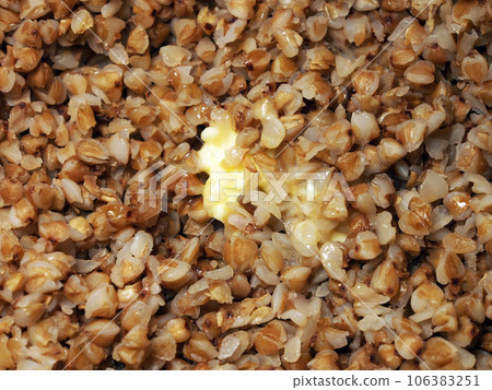 Buckwheat porridge, prepared from buckwheat groats favorite and useful product of Russian, Belarusian and Ukrainian cuisine. Healthy food, natural product, buckwheat porridge, close-up. 106383251