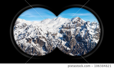 Binoculars Point of View with Snow Capped Peaks of Italian Alps Binoculars Point of View with Snow Capped Peaks of Italian Alps 106384821