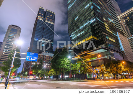 Tokyo cityscape in Japan Sultry holiday night. Business district in Otemachi, Tokyo, few people = August 19 106386167