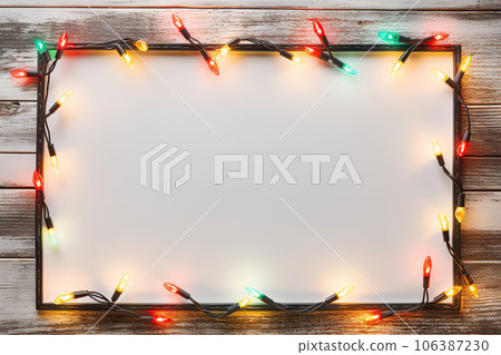 Festive Glow - Christmas Lights Bulb Frame on White Wood, Merry Christmas and New Year Holiday Background. created with Generative AI Festive Glow - Christmas Lights Bulb Frame on White Wood, Merry Christmas and New Year Holiday Background. created with Generative AI 106387230