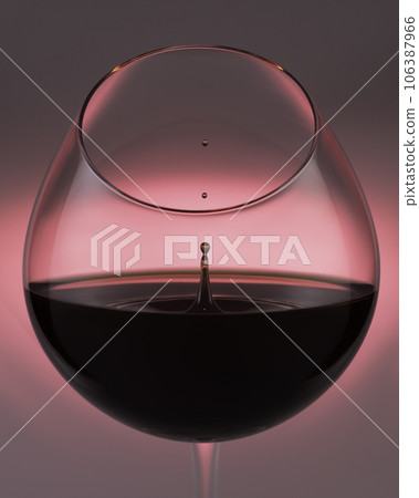 Circle shaped wine drops falling into glass closeup. Stock Photo by  stockbusters