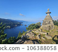 Stone lantern floating in the blue sky and sea 106388058