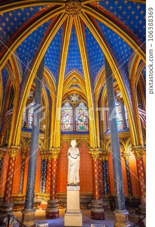 Lower chapel of Sainte-Chapelle with statue of Louis IX. Palais de la Cite, Paris, France 106388369