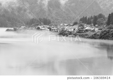 Taishi Village and Tadami Line wrapped in river fog Taishi Village and Tadami Line wrapped in river fog 106389414