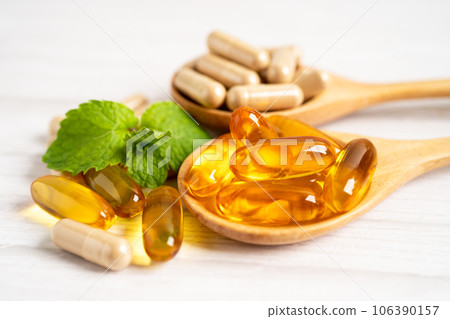 Alternative medicine herbal organic capsule with vitamin E omega 3 fish oil, mineral, drug with herbs leaf natural supplements for healthy good life. 106390157