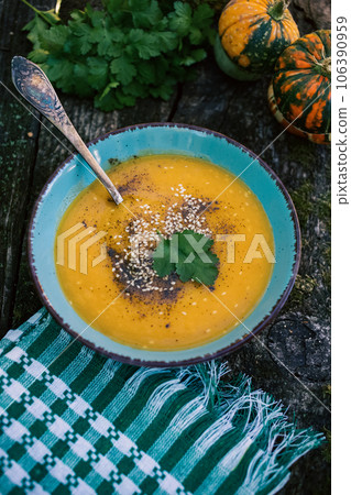 pumpkin soup on wooden table autumn dish pumpkin soup on wooden table autumn dish 106390959