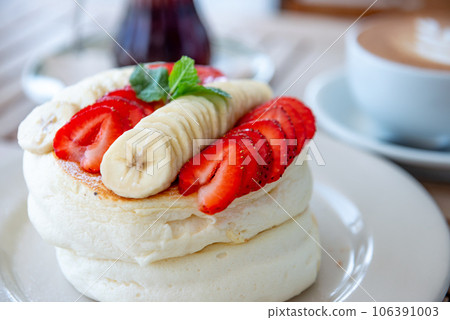 Coffee time with stylish pancakes 106391003