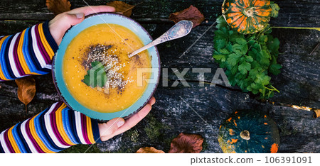 pumpkin soup on wooden table autumn dish pumpkin soup on wooden table autumn dish 106391091