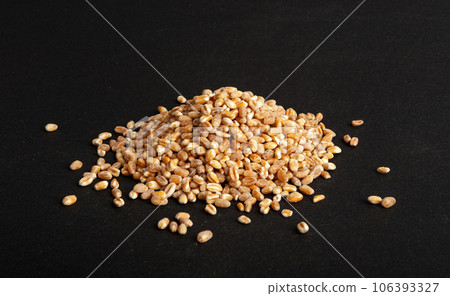 Wheat Grains, Barley Pile, Dry Cereal Seeds, Wheat Grains Heap on Black Wheat Grains, Barley Pile, Dry Cereal Seeds, Wheat Grains Heap on Black 106393327