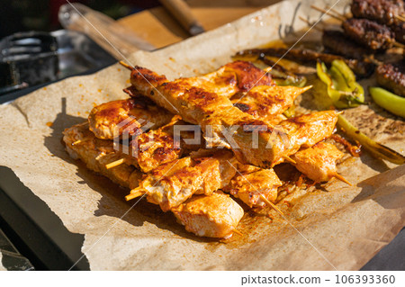 Small Skewers, Street Barbecue, Chicken Shish Kebab, Barbecue Shashlik, Skewered Grilled Chicken Meat 106393360