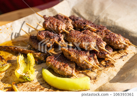 Small Skewers, Street Barbecue, Chicken Shish Kebab, Barbecue Shashlik, Skewered Grilled Chicken Meat Small Skewers, Street Barbecue, Chicken Shish Kebab, Barbecue Shashlik, Skewered Grilled Chicken Meat 106393361