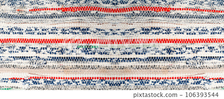 Rags Carpet Texture Background, Woven Rug Pattern, Handmade, Hand-Woven Rustic Carpet Made of Rags Rags Carpet Texture Background, Woven Rug Pattern, Handmade, Hand-Woven Rustic Carpet Made of Rags 106393544
