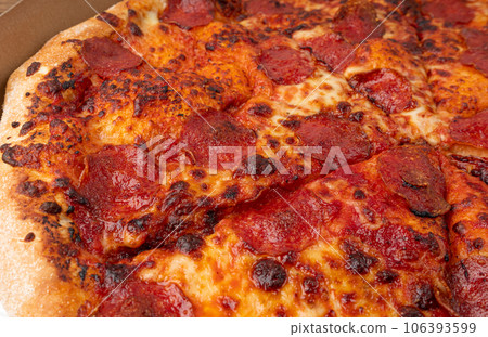 Pepperoni Pizza with Pickled Hot Jalapeno Peppers in Cardboard Delivery Box, Salami Pizza Pepperoni Pizza with Pickled Hot Jalapeno Peppers in Cardboard Delivery Box, Salami Pizza 106393599