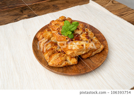 Maple Pecan Puff Pastry Isolated, Danish Plaits Pastries with Maple Syrup and Pecan Nuts, Breakfast Bakery Maple Pecan Puff Pastry Isolated, Danish Plaits Pastries with Maple Syrup and Pecan Nuts, Breakfast Bakery 106393754