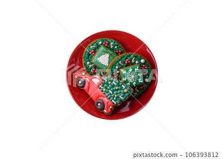 Beautiful bright colorful homemade gingerbread cookies on a ceramic plate Beautiful bright colorful homemade gingerbread cookies on a ceramic plate 106393812