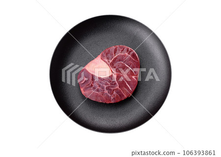 Fresh beef ossobuco steak with salt, spices and herbs 106393861