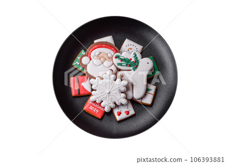 Delicious fresh colorful Christmas or New Year gingerbread cookies 106393881