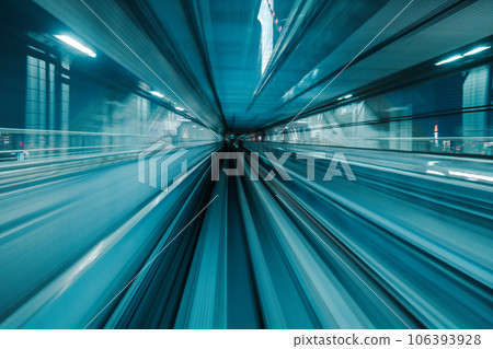 Motion blurred of train moving inside tunnel with 106393928