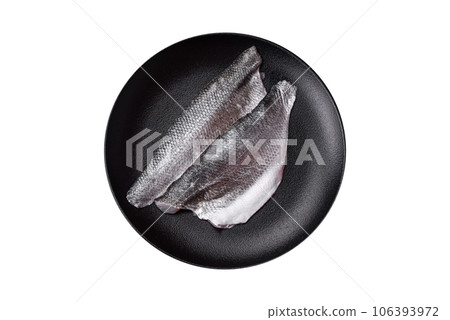 Raw sea bass fish fillet with salt, spices and herbs on a ceramic plate Raw sea bass fish fillet with salt, spices and herbs on a ceramic plate 106393972