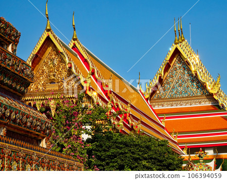 Luxurious gilded roofs of Thai monasteries, Asian religious architecture, landscape. Luxurious gilded roofs of Thai monasteries, Asian religious architecture, landscape. 106394059