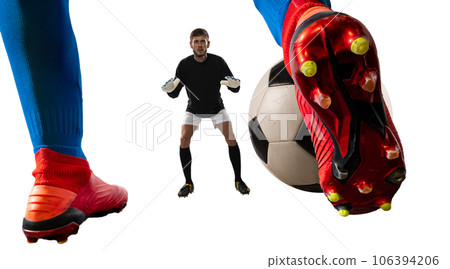 Goalkeeper catches the ball during a football game Goalkeeper catches the ball during a football game 106394206