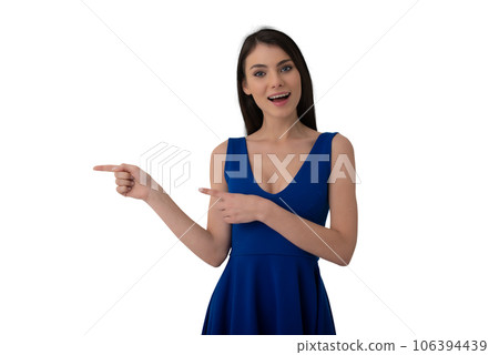 Isolated happy and joyful  woman indicates something 106394439