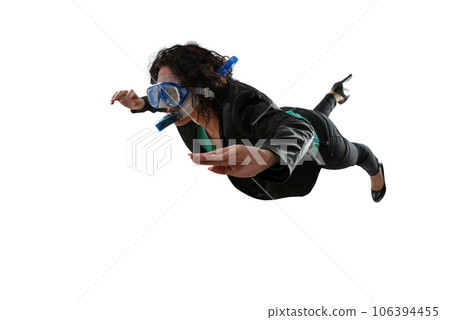 businesswoman with mask swims underwater 106394455