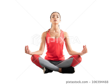 Isolated young woman relaxing in yoga pilates position Isolated young woman relaxing in yoga pilates position 106394488
