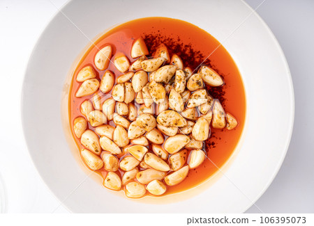 Pickled Garlic, Fermented Garlic Cloves with Red Chili Pepper, Hot Pickle Vegetable, Spices Garlic Cloves Pickled Garlic, Fermented Garlic Cloves with Red Chili Pepper, Hot Pickle Vegetable, Spices Garlic Cloves 106395073