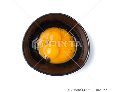 Beaten Egg Yolks in Bowl, Fresh Chicken Eggs for Cooking 106395398
