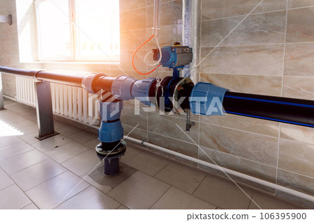 Pressure sensor in an industrial boiler room. Barometer in the heating system. Close-up. 106395900