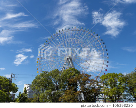 Landscape of blue sky and Ferris wheel 106398220
