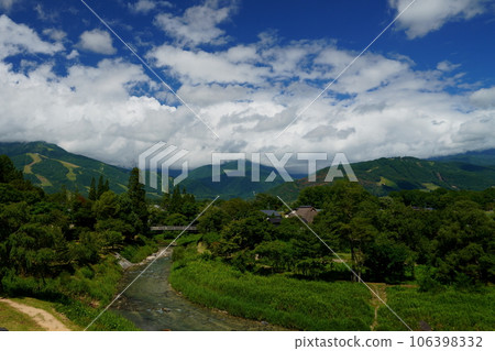 Midsummer Oide Park and clouds hiding the Northern Alps Midsummer Oide Park and clouds hiding the Northern Alps 106398332