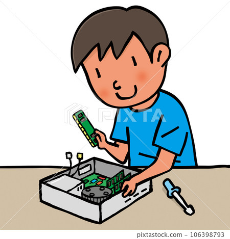 child assembling a computer 106398793