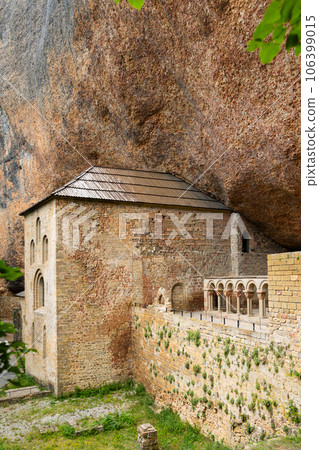 Old monastery of San Juan de la Pena - built right into rock. Huesca province, Aragon, Spain Old monastery of San Juan de la Pena - built right into rock. Huesca province, Aragon, Spain 106399015