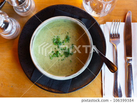 Vegetable puree served in a soup plate Vegetable puree served in a soup plate 106399384