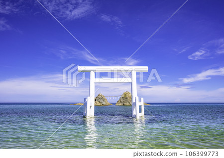 Beautiful transparent sea of Futamigaura, white torii gate and Meoto Iwa (Itoshima City, Fukuoka Prefecture) Beautiful transparent sea of Futamigaura, white torii gate and Meoto Iwa (Itoshima City, Fukuoka Prefecture) 106399773