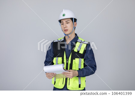 millennials and gen z, korean asian young man, site staff checking a document 106401399