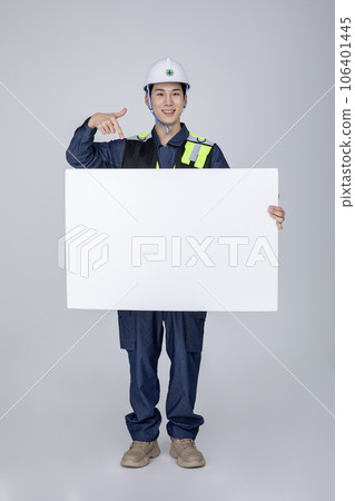 millennials and gen z, korean asian young man, site staff pointing a frame panel 106401445